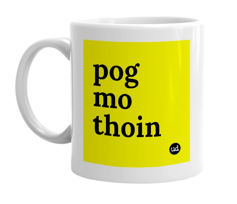 White mug with 'pog mo thoin' in bold black letters
