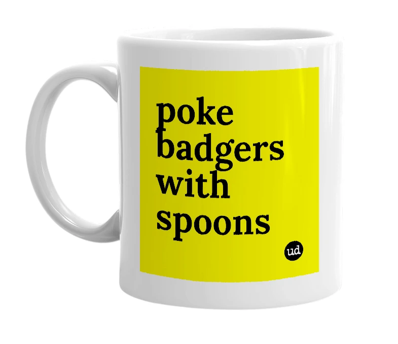 White mug with 'poke badgers with spoons' in bold black letters