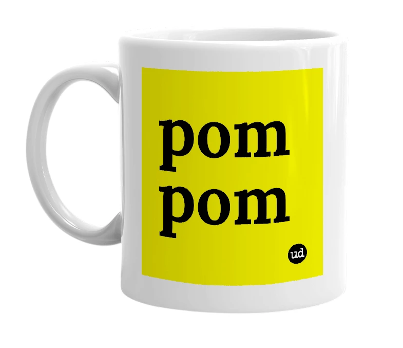 White mug with 'pom pom' in bold black letters