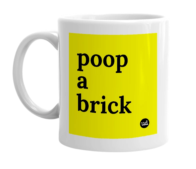 White mug with 'poop a brick' in bold black letters
