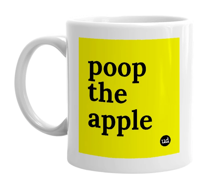 White mug with 'poop the apple' in bold black letters