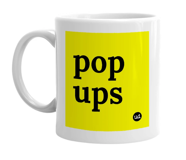 White mug with 'pop ups' in bold black letters