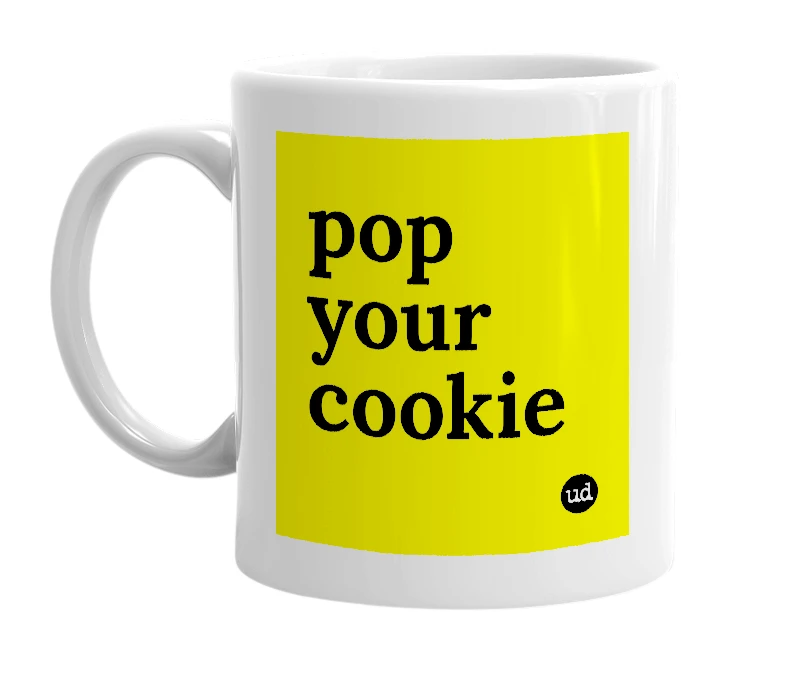 White mug with 'pop your cookie' in bold black letters