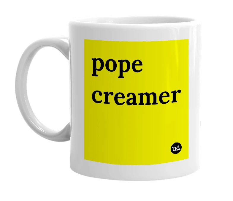 White mug with 'pope creamer' in bold black letters