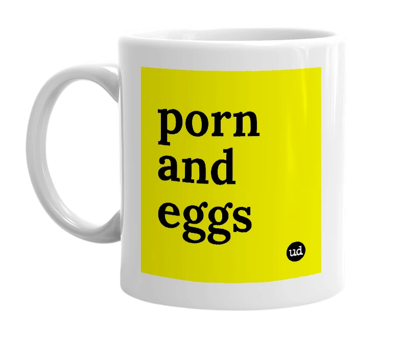 White mug with 'porn and eggs' in bold black letters