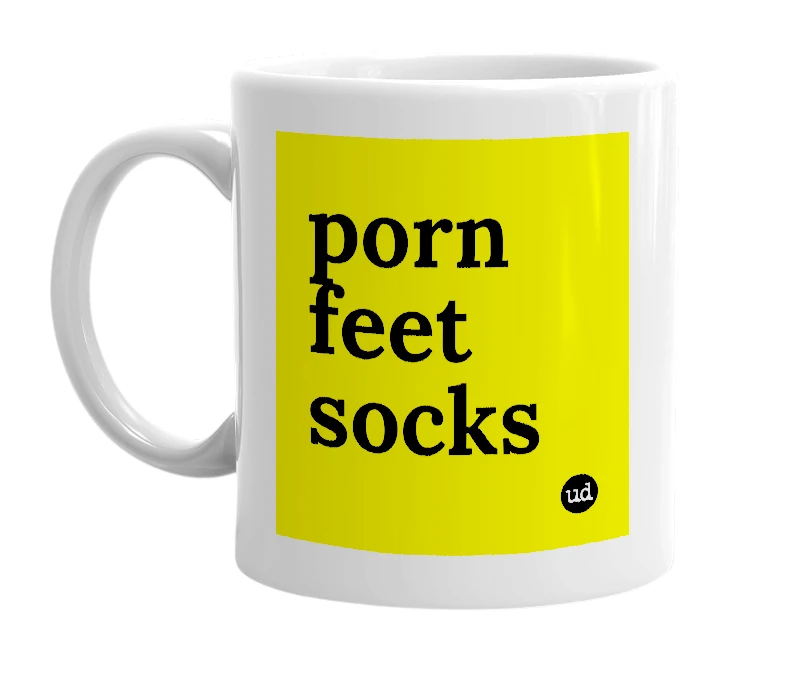 White mug with 'porn feet socks' in bold black letters