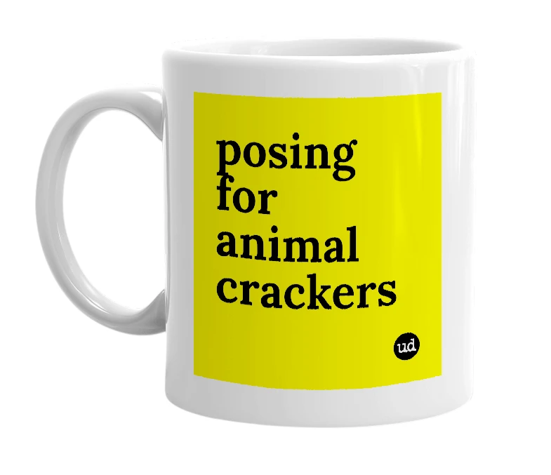 White mug with 'posing for animal crackers' in bold black letters