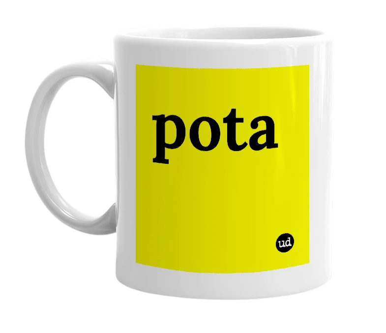 White mug with 'pota' in bold black letters