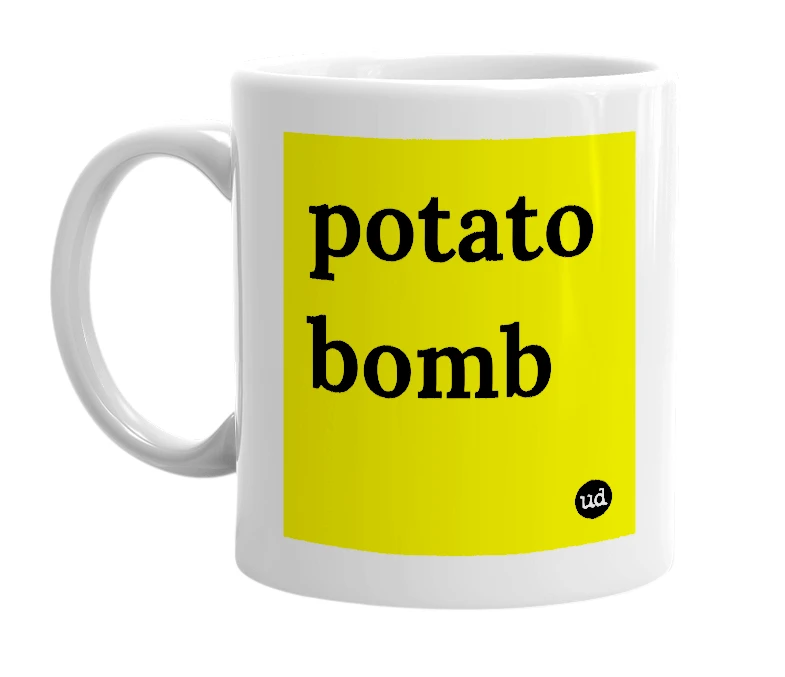 White mug with 'potato bomb' in bold black letters