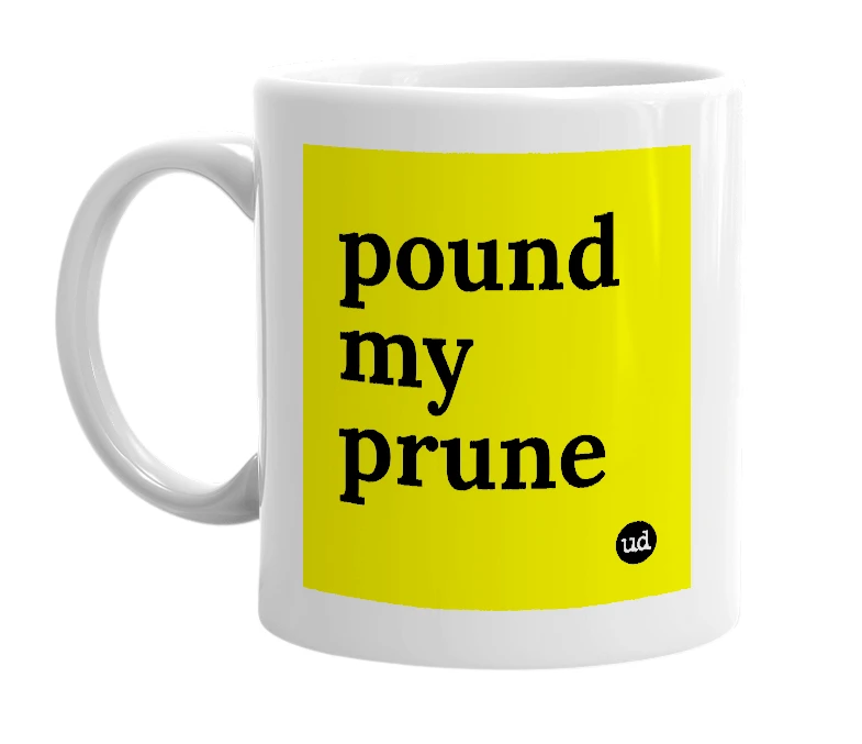White mug with 'pound my prune' in bold black letters