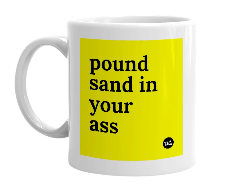 White mug with 'pound sand in your ass' in bold black letters