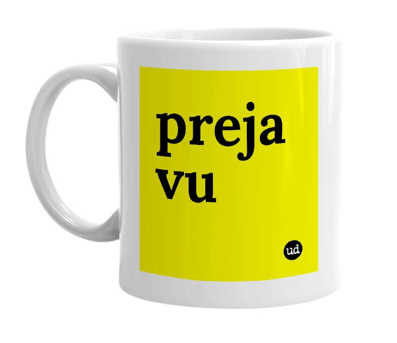 White mug with 'preja vu' in bold black letters