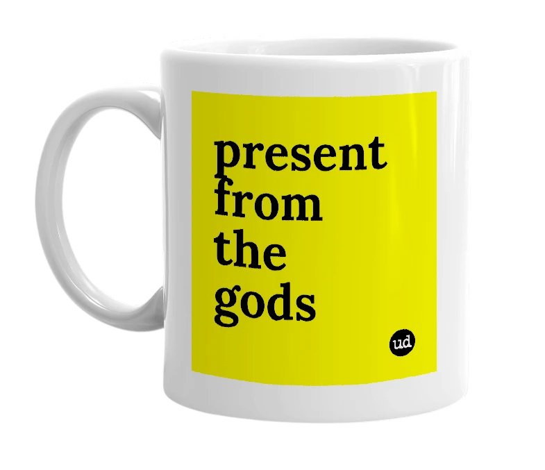 White mug with 'present from the gods' in bold black letters