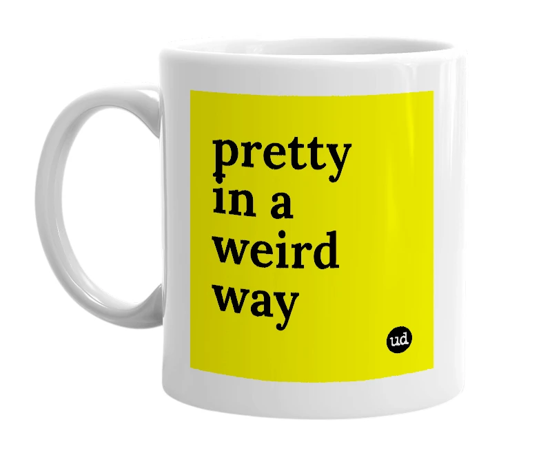 White mug with 'pretty in a weird way' in bold black letters