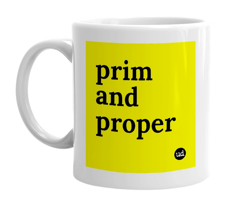 White mug with 'prim and proper' in bold black letters