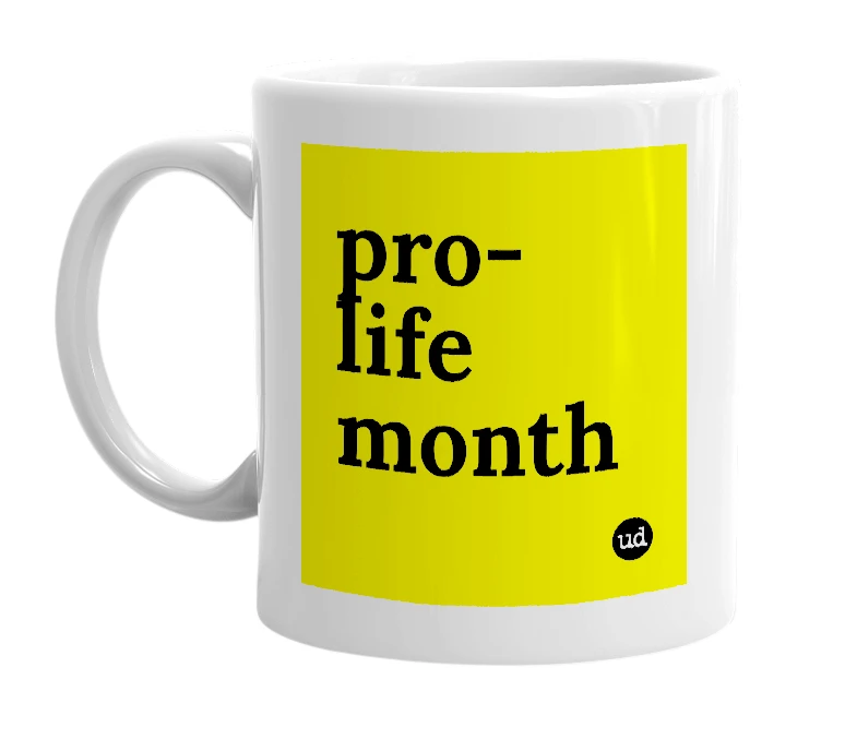 White mug with 'pro-life month' in bold black letters
