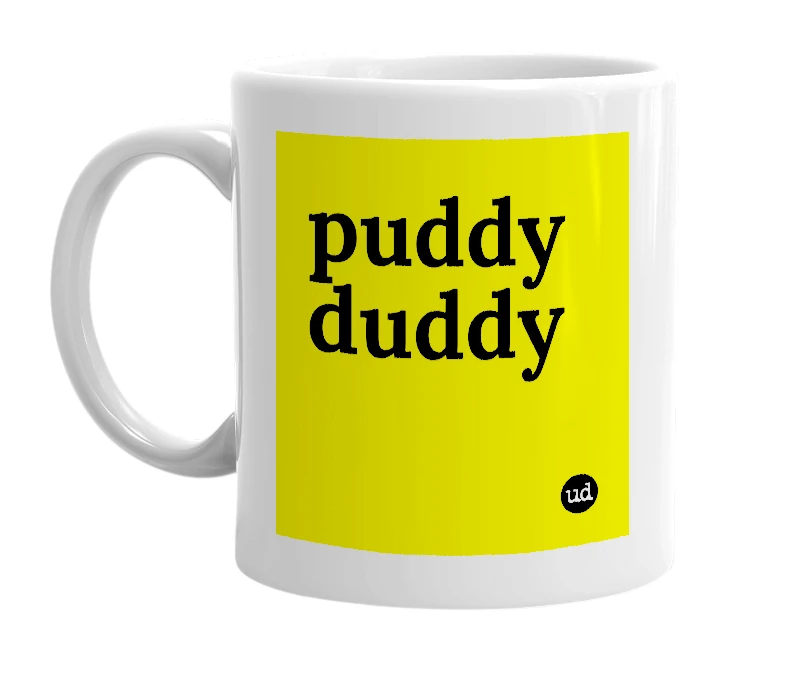 White mug with 'puddy duddy' in bold black letters