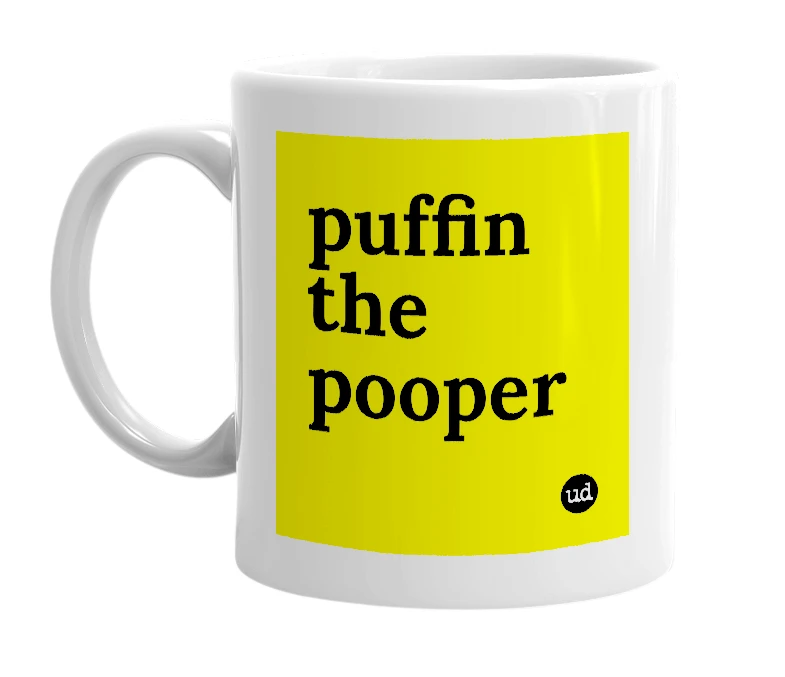 White mug with 'puffin the pooper' in bold black letters