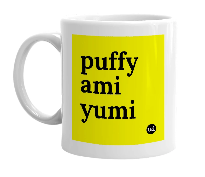 White mug with 'puffy ami yumi' in bold black letters