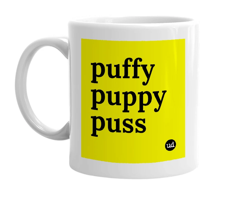 White mug with 'puffy puppy puss' in bold black letters