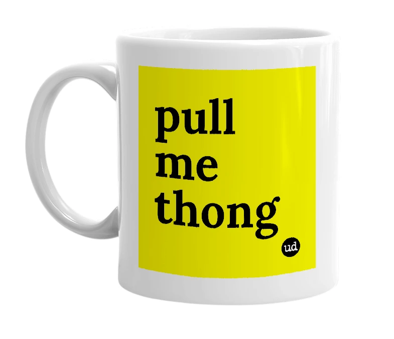 White mug with 'pull me thong' in bold black letters