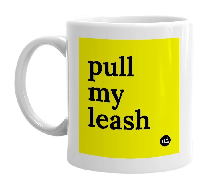 White mug with 'pull my leash' in bold black letters
