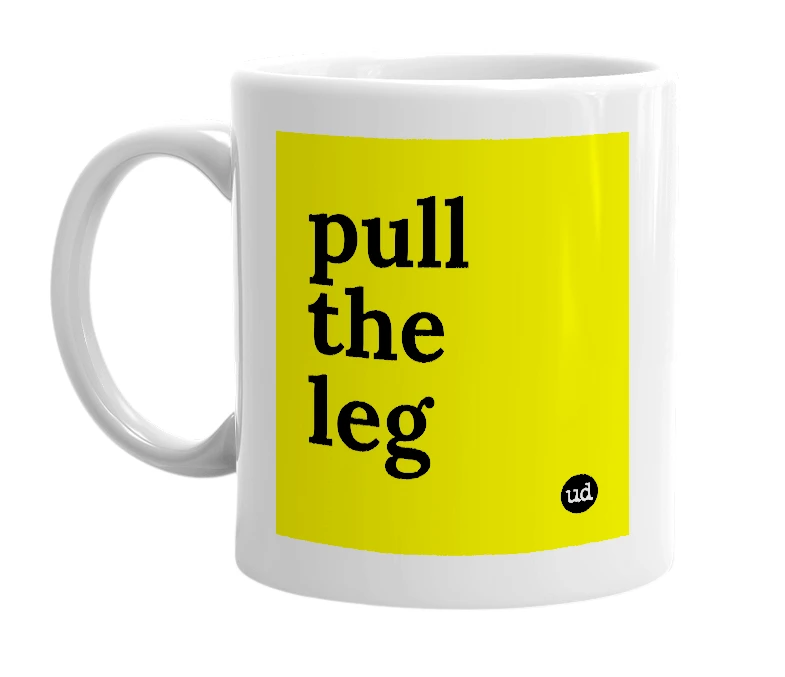 White mug with 'pull the leg' in bold black letters