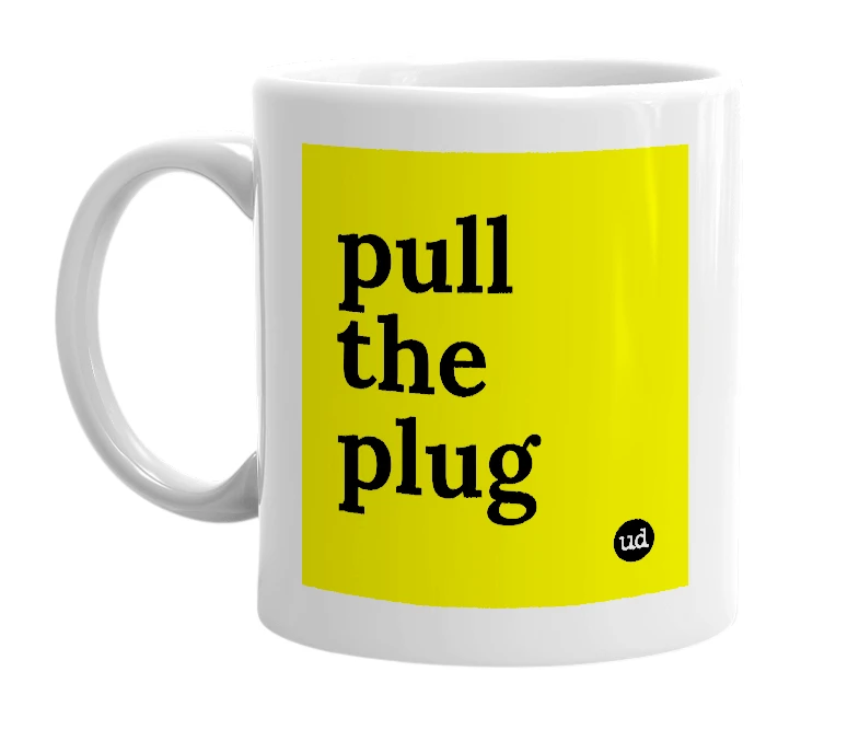 White mug with 'pull the plug' in bold black letters