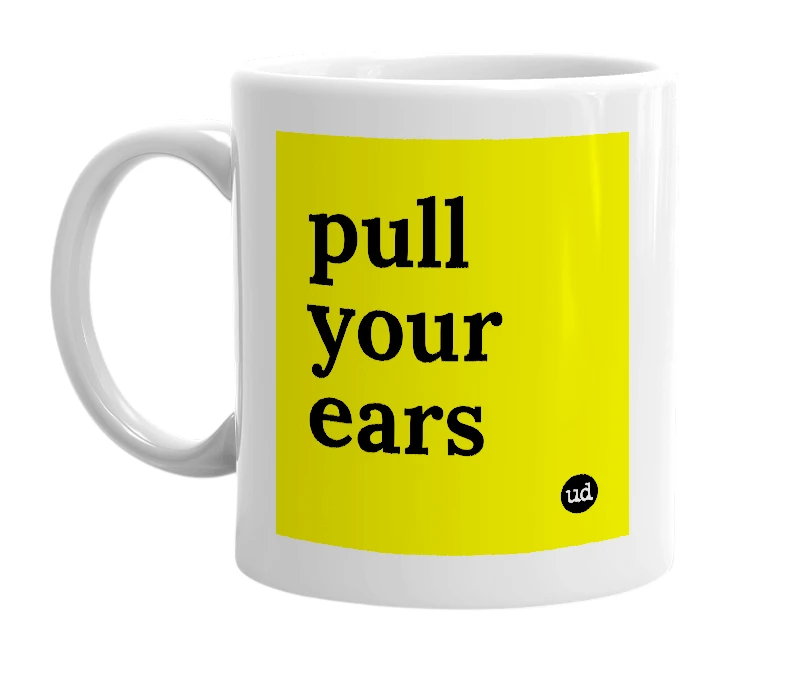 White mug with 'pull your ears' in bold black letters