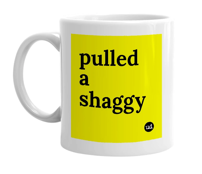 White mug with 'pulled a shaggy' in bold black letters