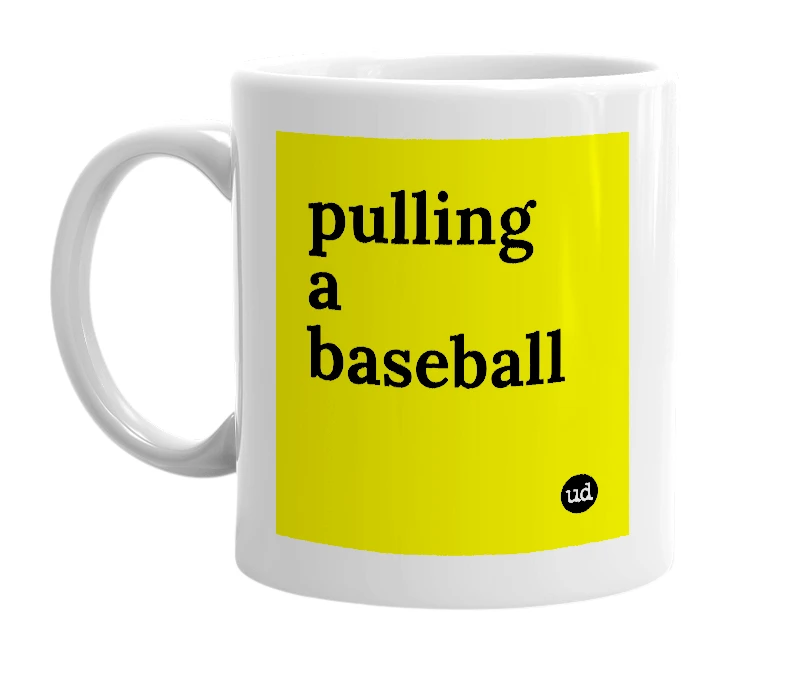 White mug with 'pulling a baseball' in bold black letters