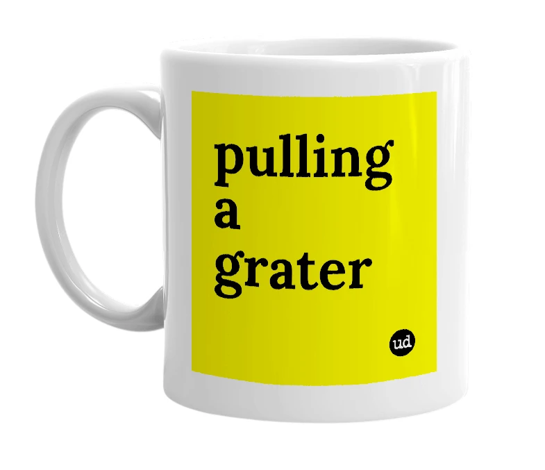 White mug with 'pulling a grater' in bold black letters