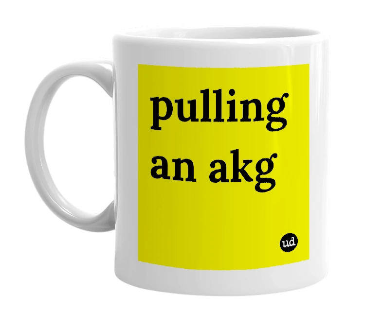 White mug with 'pulling an akg' in bold black letters
