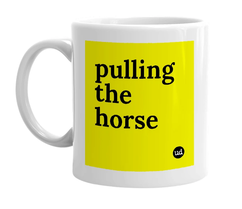 White mug with 'pulling the horse' in bold black letters