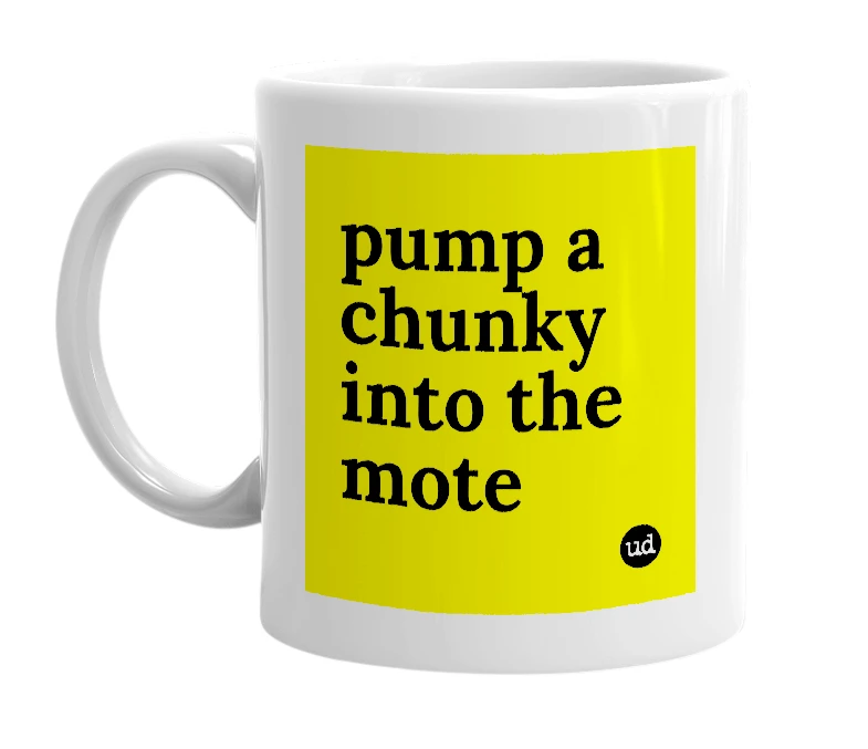 White mug with 'pump a chunky into the mote' in bold black letters