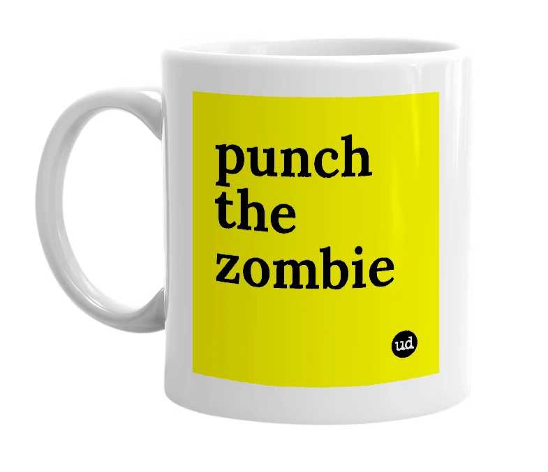 White mug with 'punch the zombie' in bold black letters