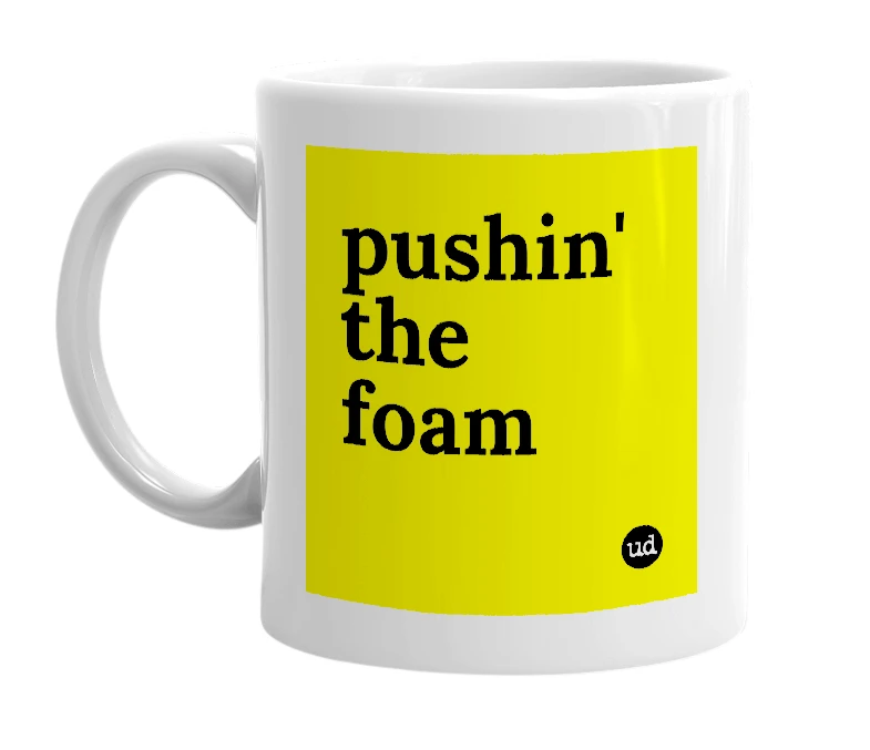White mug with 'pushin' the foam' in bold black letters