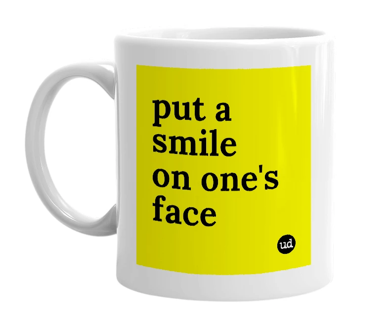 White mug with 'put a smile on one's face' in bold black letters