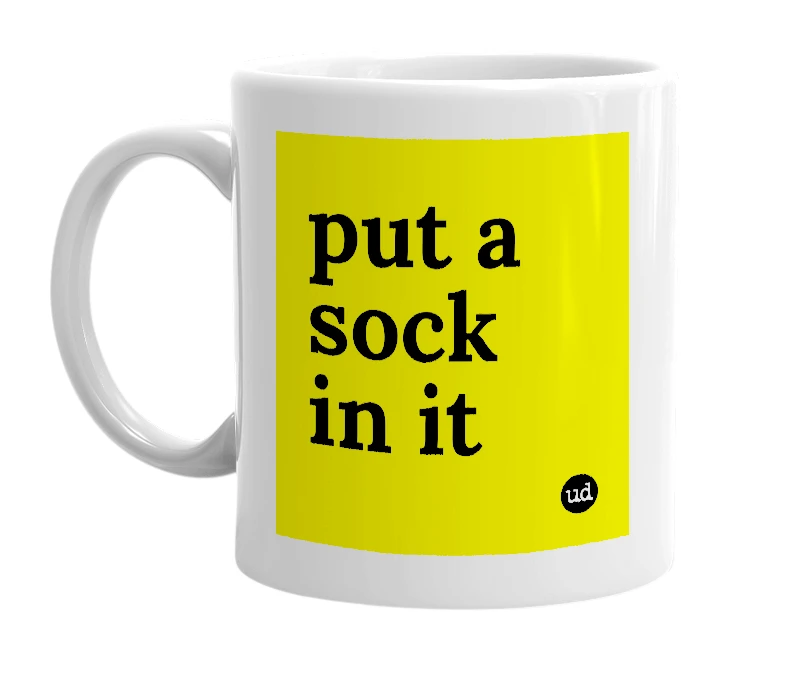 White mug with 'put a sock in it' in bold black letters