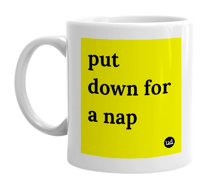 White mug with 'put down for a nap' in bold black letters