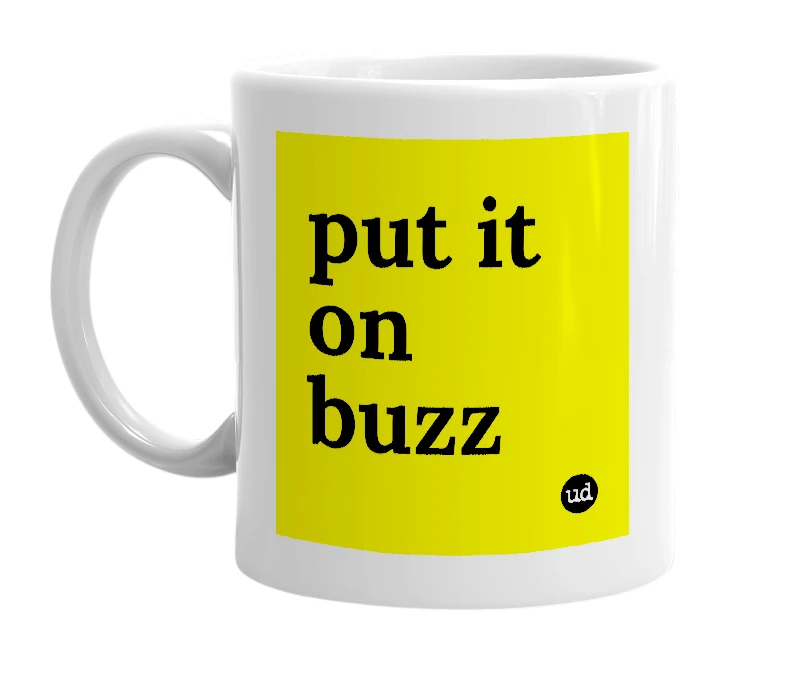 White mug with 'put it on buzz' in bold black letters