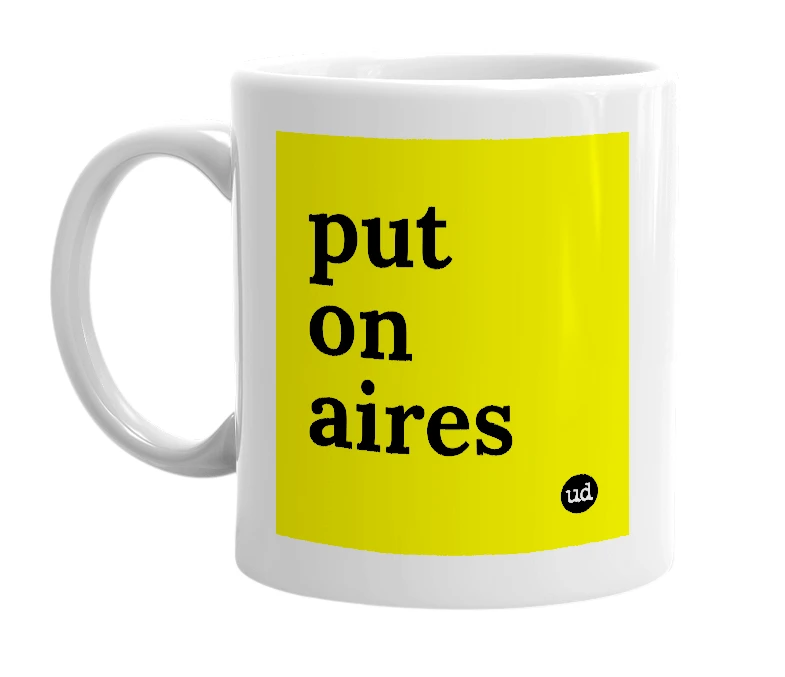 White mug with 'put on aires' in bold black letters