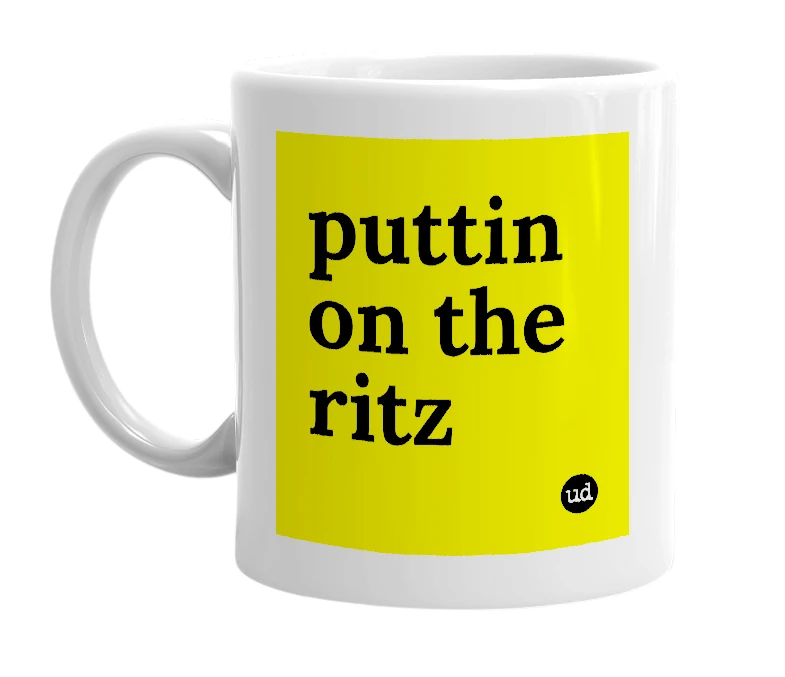 White mug with 'puttin on the ritz' in bold black letters