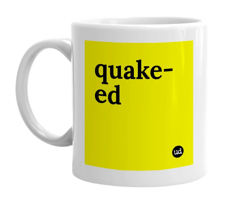 White mug with 'quake-ed' in bold black letters