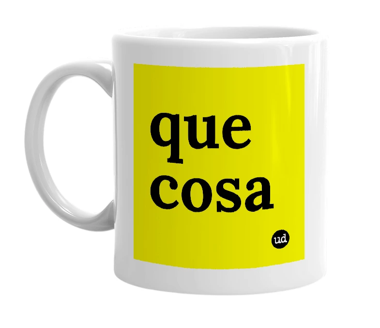 White mug with 'que cosa' in bold black letters