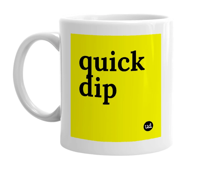 White mug with 'quick dip' in bold black letters