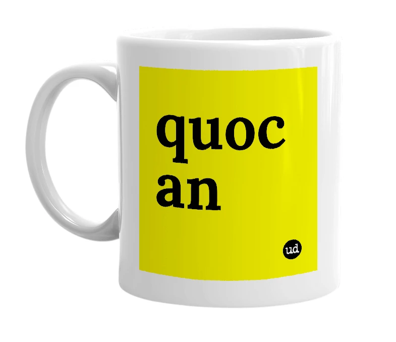 White mug with 'quoc an' in bold black letters