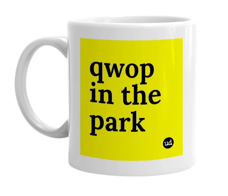 White mug with 'qwop in the park' in bold black letters