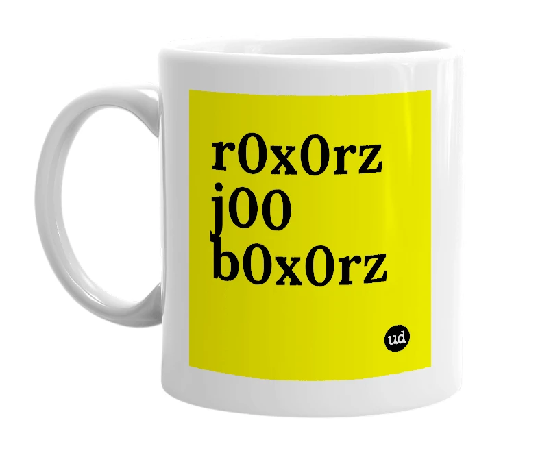 White mug with 'r0x0rz j00 b0x0rz' in bold black letters