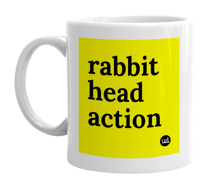 White mug with 'rabbit head action' in bold black letters